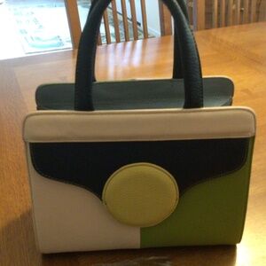 Leather purse in multi colors with handle and detachable shoulder strap. NWOT